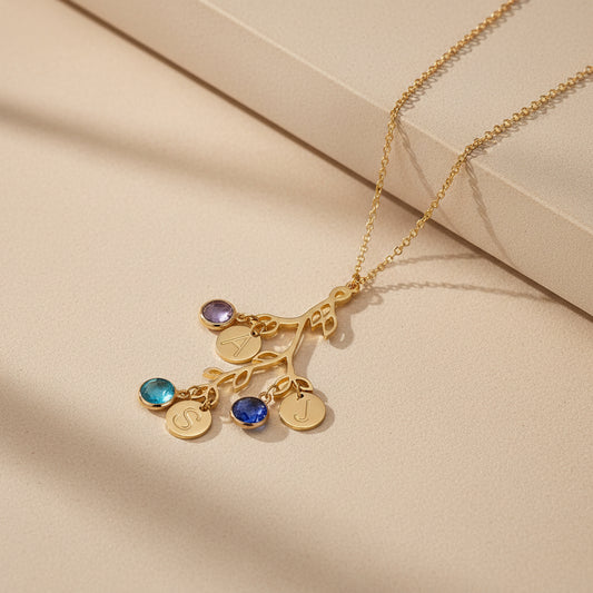 initial necklace with many charms and birthstone