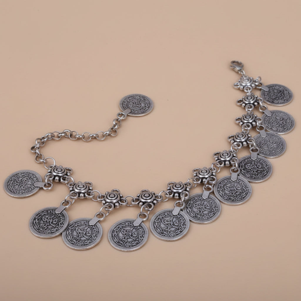 Beautiful silver-filled boho coin anklet with ethnic beachy vibes. Perfect for vacations, honeymoons, maternity shoots, or everyday boho style. Sold as a single or pair, customizable up to size 11 for the perfect fit.